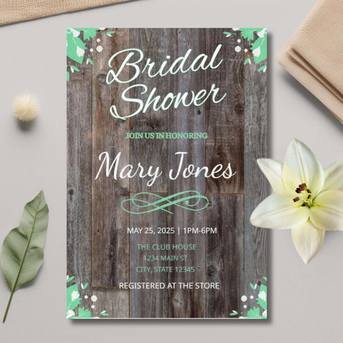 Bridal shower invitation with wooden planks design on a light gray surface with decorative elements.